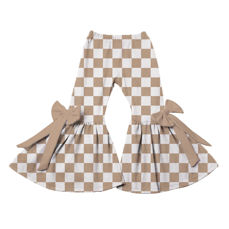 Wholesale bamboo kids pajamas displayed on hangers, showcasing soft, sustainable fabric ideal for eco-friendly retailers.