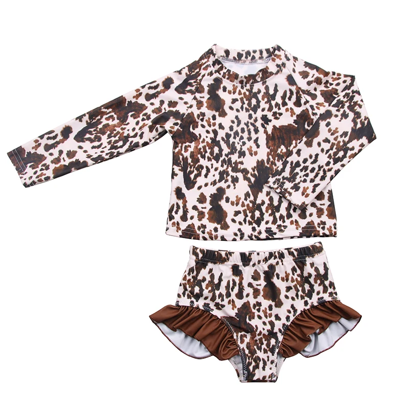 Eco-friendly bamboo pajamas wholesale shipment loaded onto a truck near sustainable trash bins for B2B distribution.