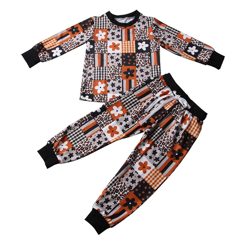 Soft and cozy autumn baby cardigan made from premium cotton, ideal for B2B wholesale buyers seeking high-quality infant apparel.