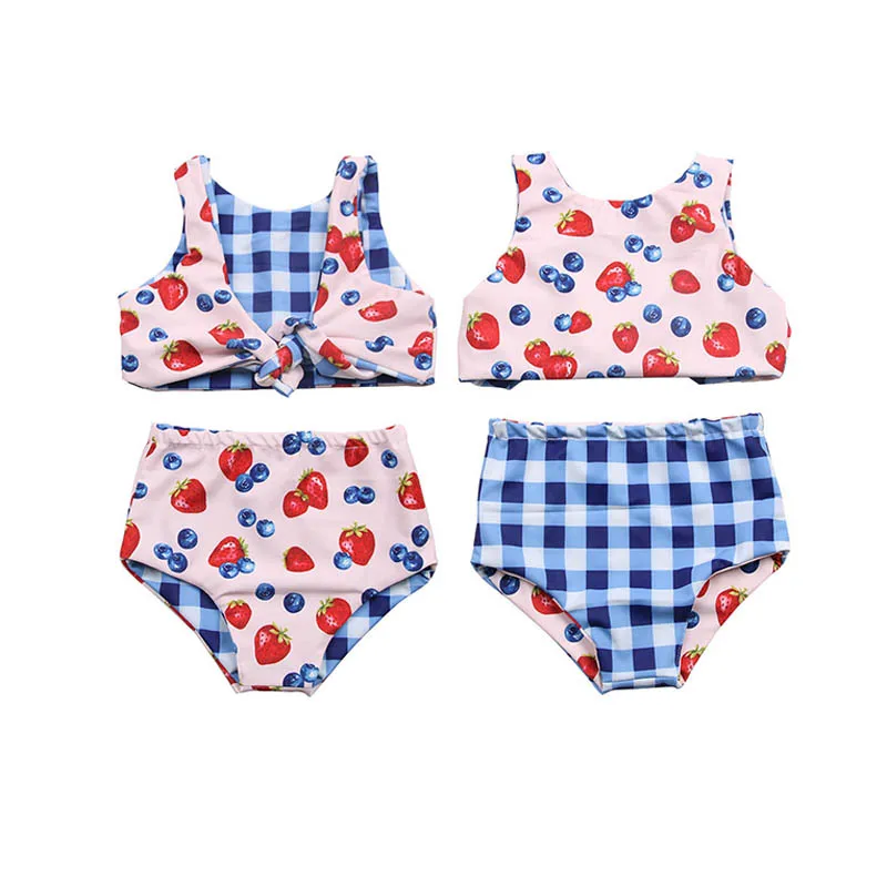 Soft bamboo baby onesies in assorted colors displayed neatly – premium, eco-friendly wholesale options for retailers seeking quality baby apparel.