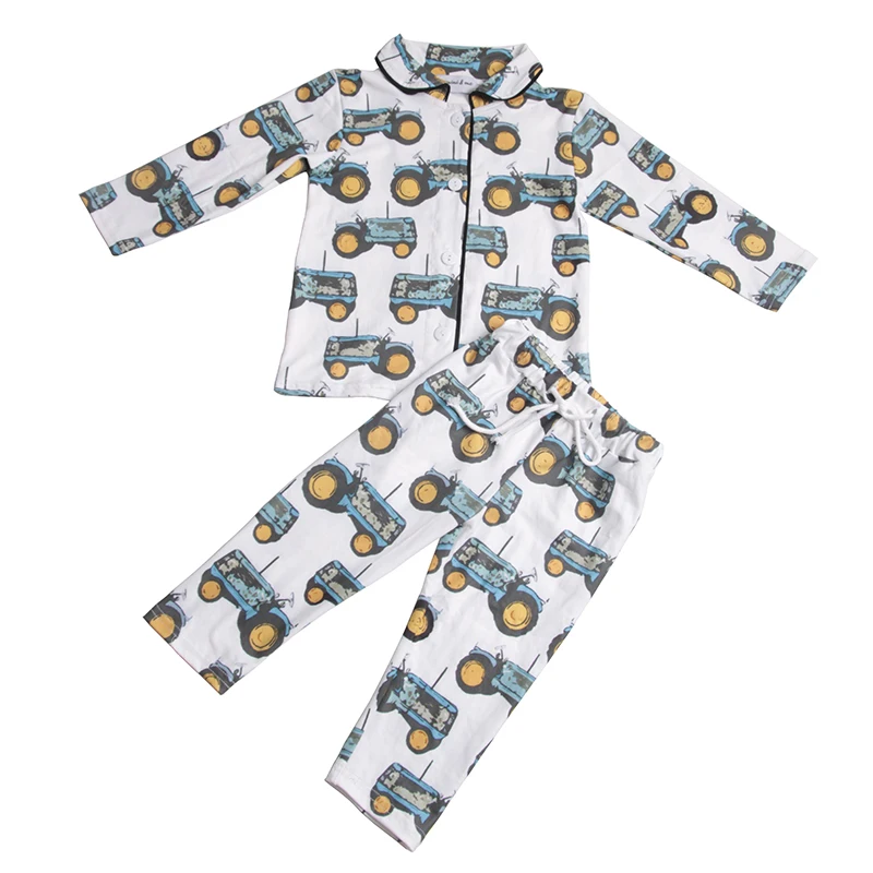 Cozy family in matching Christmas pajamas, perfect for B2B wholesale buyers seeking festive holiday apparel for retail collections.