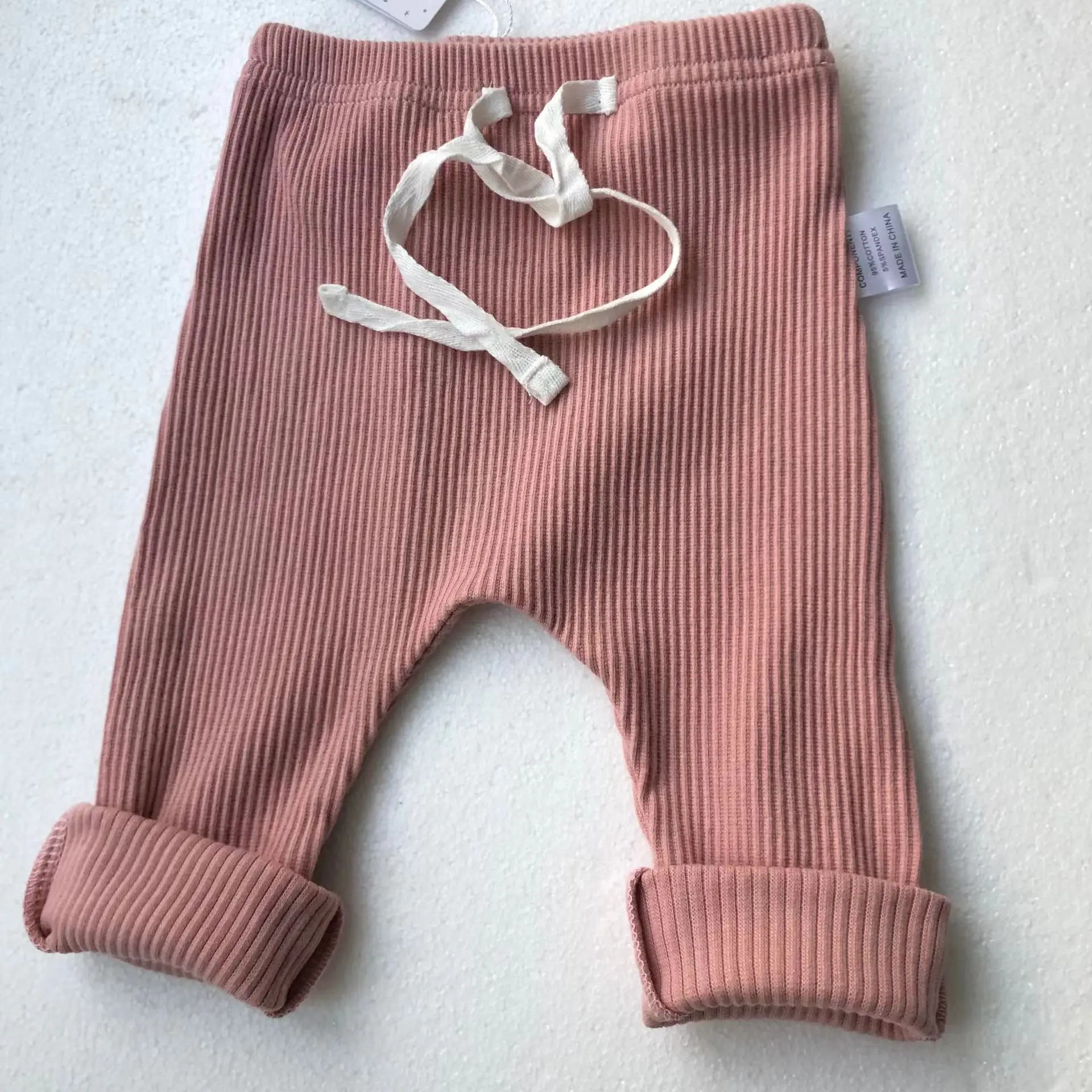 Wholesale baby onesies in bulk – soft, high-quality fabrics perfect for retailers seeking affordable, stylish infant apparel for resale.