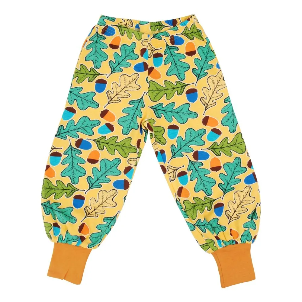 Soft bamboo baby pajamas set in neutral tones, perfect for eco-friendly wholesale baby clothing suppliers and sustainable retail businesses.