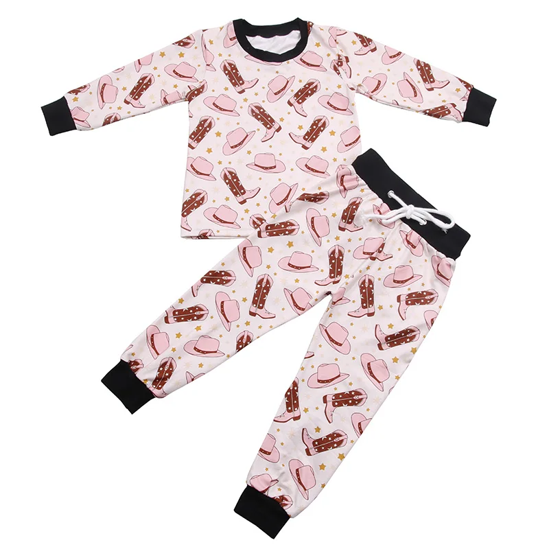 Soft bamboo baby pajamas displayed on a sleek pallet, ideal for B2B wholesale buyers seeking sustainable and high-quality infant apparel.