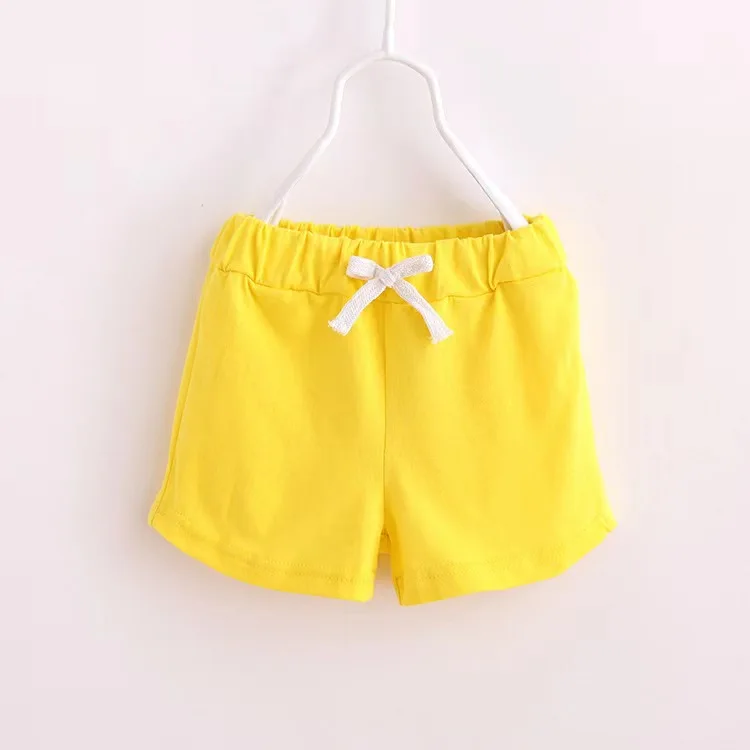 Wholesale organic bamboo baby rompers and pajamas in solid colors, perfect for B2B factories seeking premium, customizable eco-friendly babywear mystery boxes.